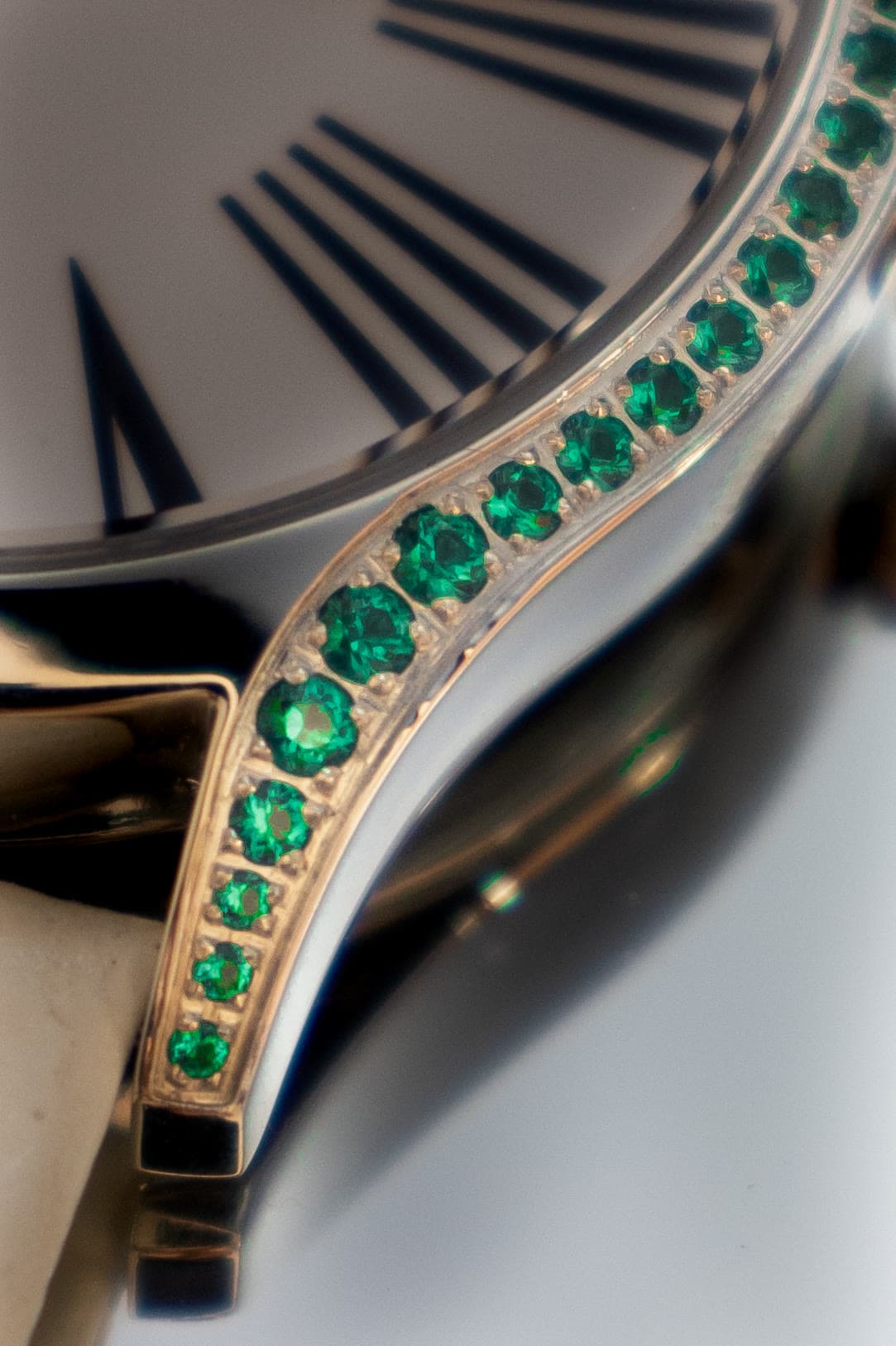Emerald inlay on an AWI watch case, macro