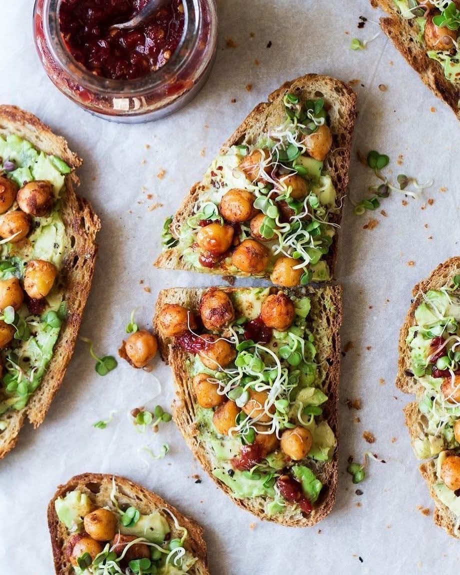 Toasts with avocado, chickpeas and microgreens